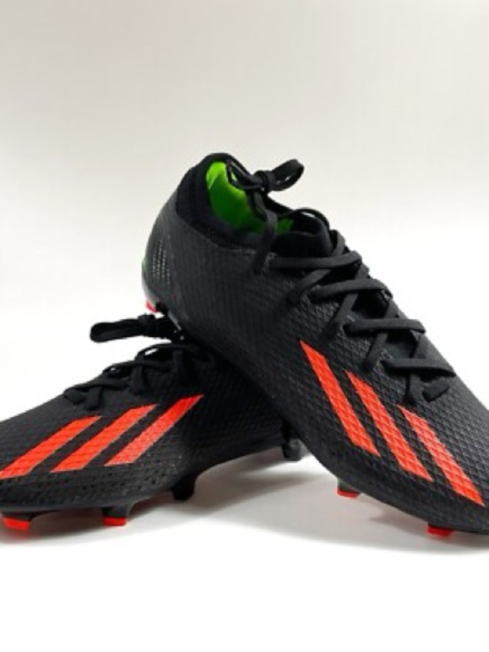 adidas Men's Black Soccer Cleats with Orange Stripes and Green Lining